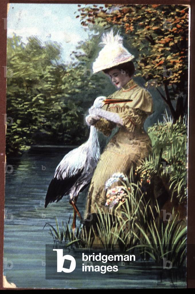 stork bringing a baby to a woman, french postacrd, early 20th century