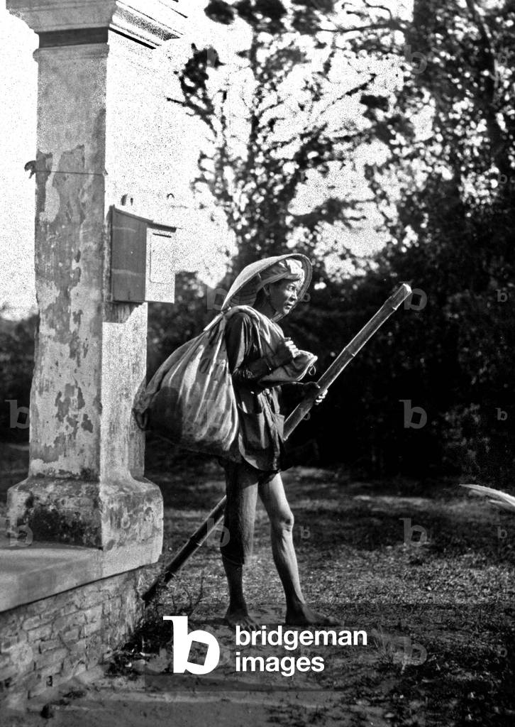Post worker in Indochina, c.1920 (b/w photo)