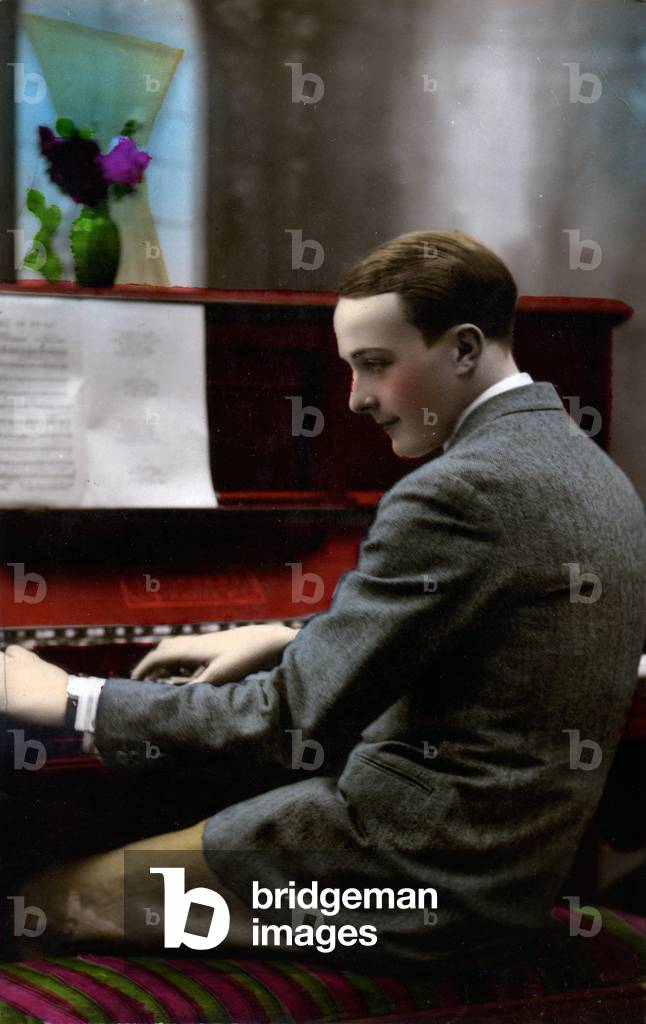 Music. Young guy at the piano. Photo kitsch, Hungary, c.1930 (postcard)