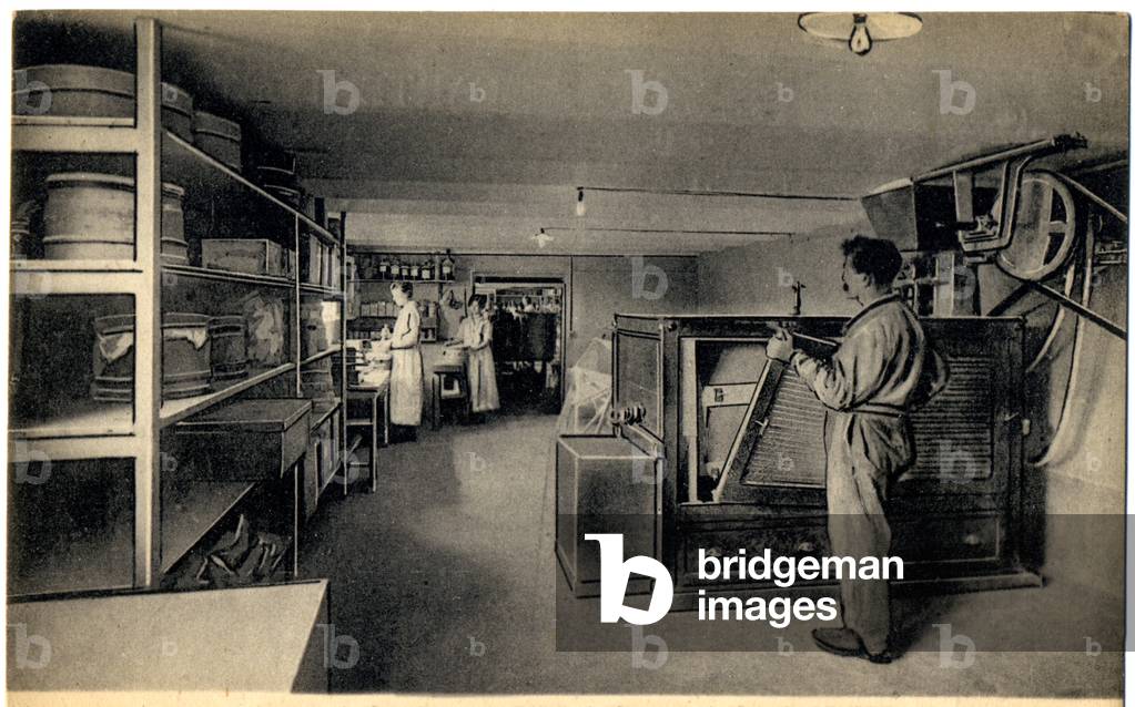 Lifestyle. Cosmetics. Making of the face powder in a perfume manufacture. Illustration, France, c.1930.