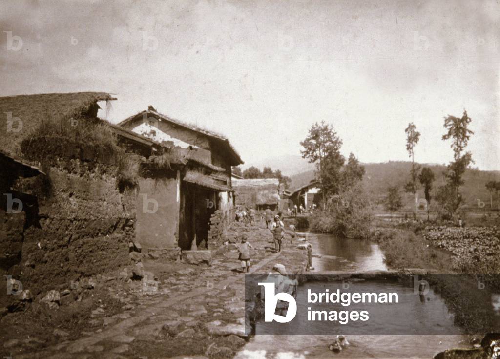 A village near Yunnanfu, China (b/w photo)