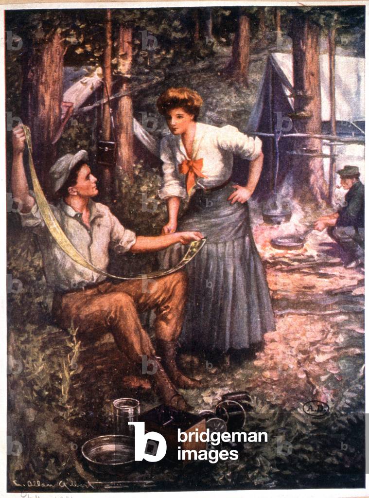 Photograph. Developing semi-rigid film in a forest camp, early 20th century (illustration)