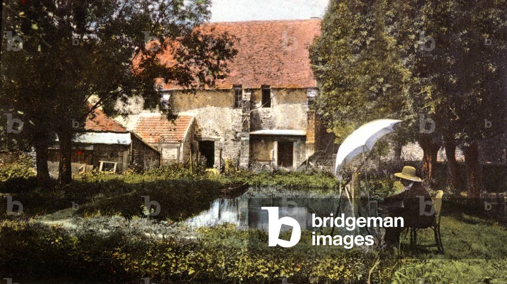 Painter by the water at the old mill in the Chevreuse valley, c.1910 (postcard)