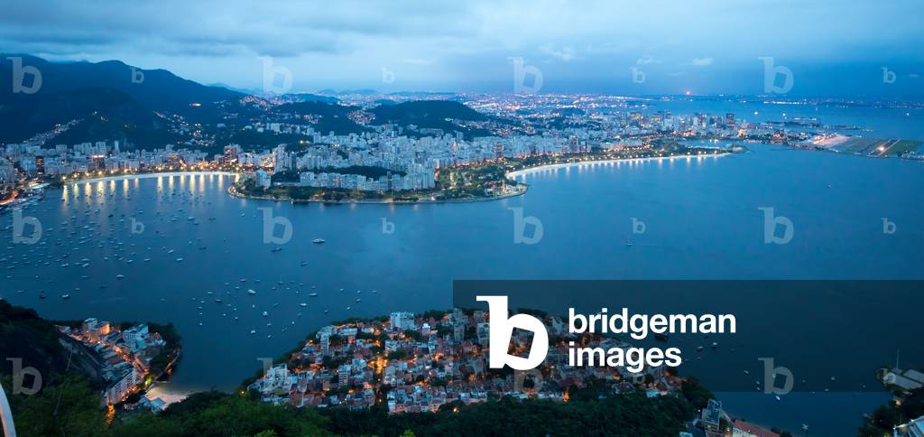 City panorama at dusk from the top of Sugarloaf Mountain, Rio de Janeiro, Brazil, March 2018 (photo)