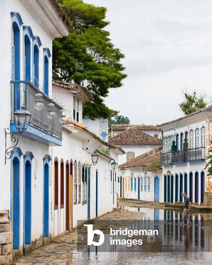 Tide flooded colonial era street, Historic Center District, Paraty, Brazil, March 2018 (photo)
