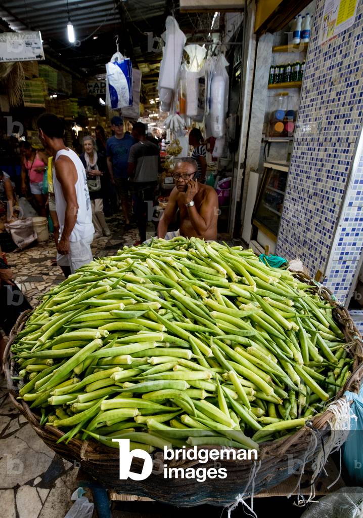 Okra on sale on market stall in São Joaquim Market, Salvador de Bahia, Brazil, March 2018 (photo)