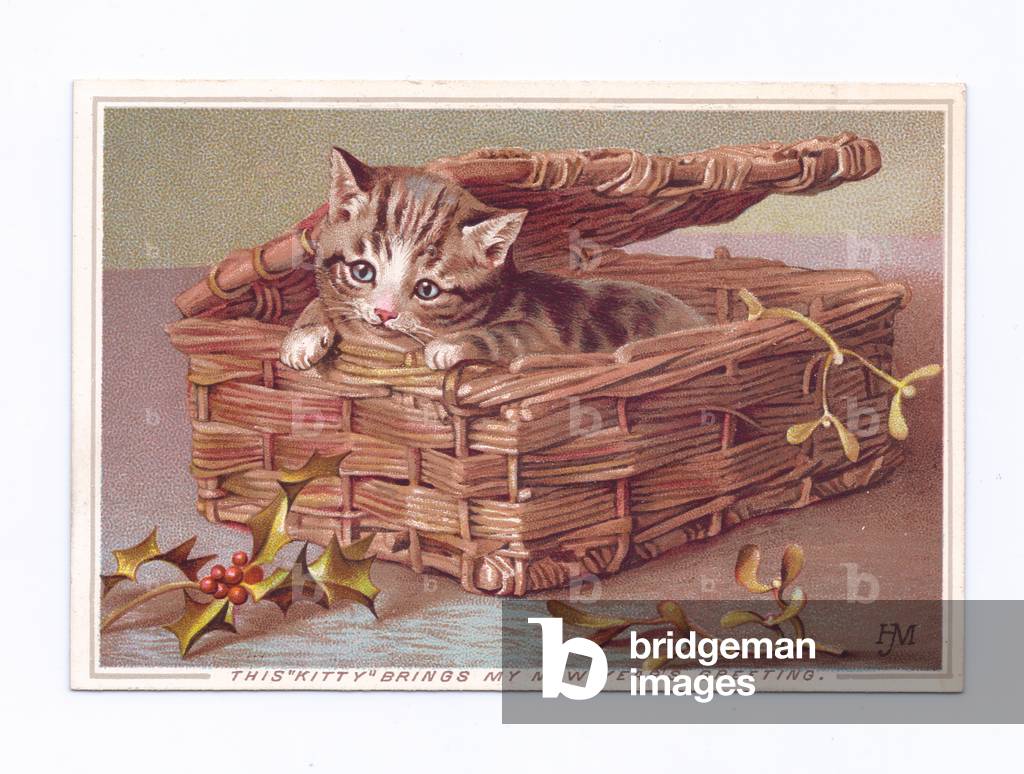 A Victorian New Year card of a kitten in a wicker basket, c.1880 (colour litho)