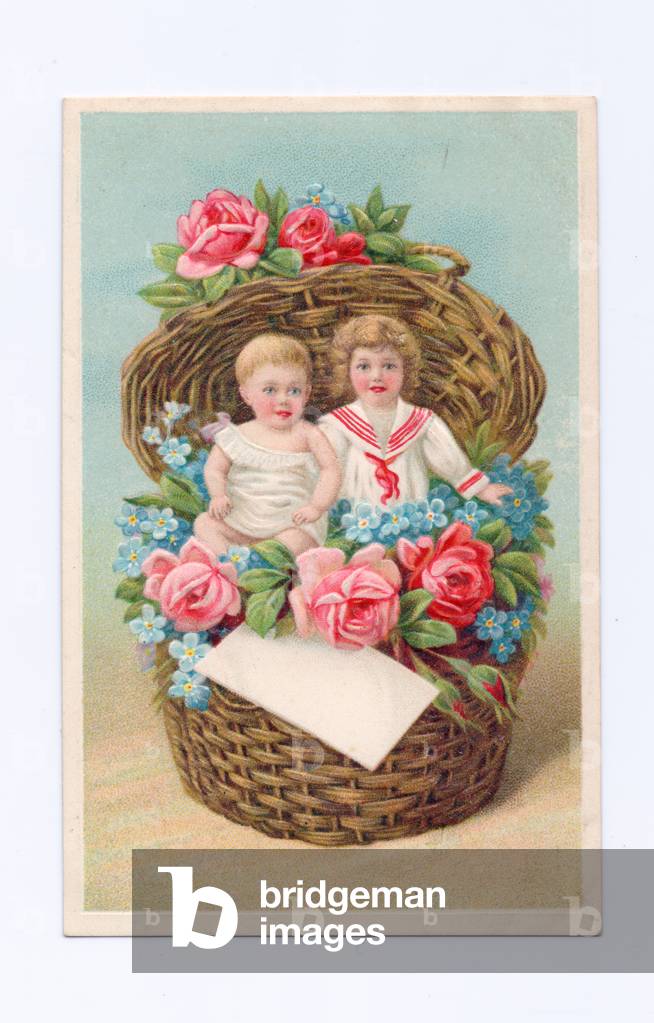 Edwardian postcard of two children sitting in a basket of flowers, c.1910 (colour litho)