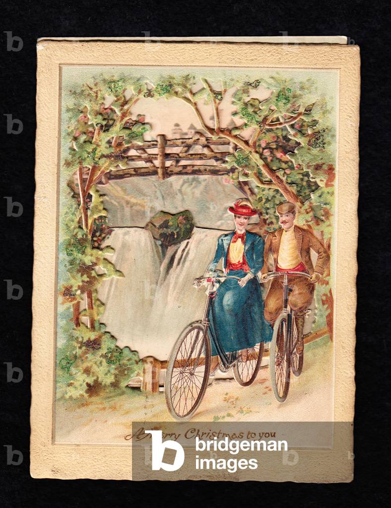 A Victorian three dimensional Christmas card of a man and a woman bicyling next to a waterfall, c.1880 (colour litho)