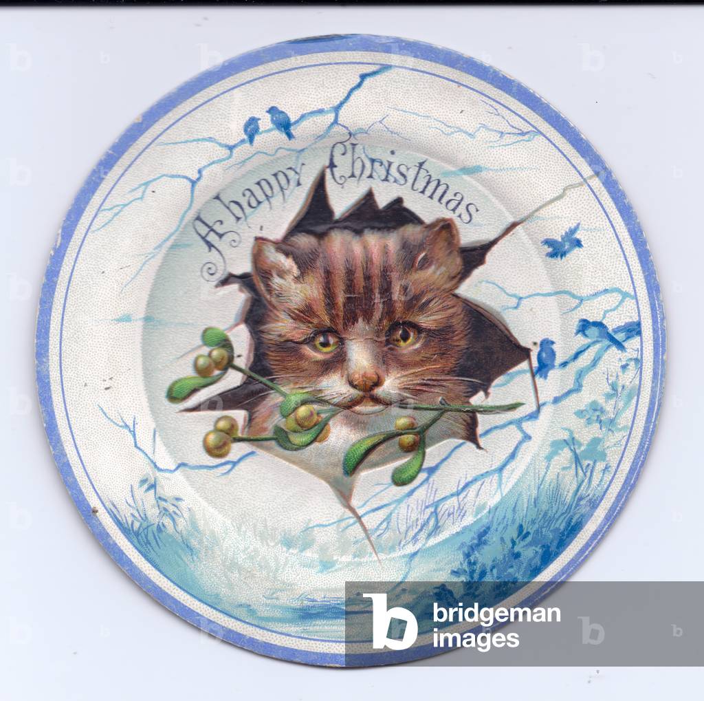 A Victorian die cut embossed Christmas card of a decorative plate with a kitten poking it's head through with a mistletoe, c.1880 (colour litho)