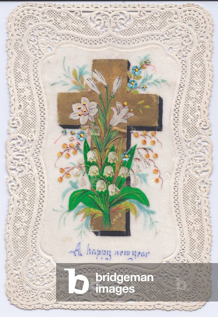 A Victorian New Year Card with a hand-painted picture of a crucifix, lillies, snowdrops and forget-me-nots on rice paper all  in an intricate pierced paper-lace border, circa 1880 (coloured lithograph)