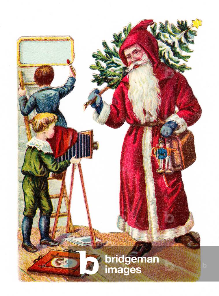 A Victorian Paper Scrap Relief of a boy taking a photograph of Father Christmas, c.1880 (colour litho)