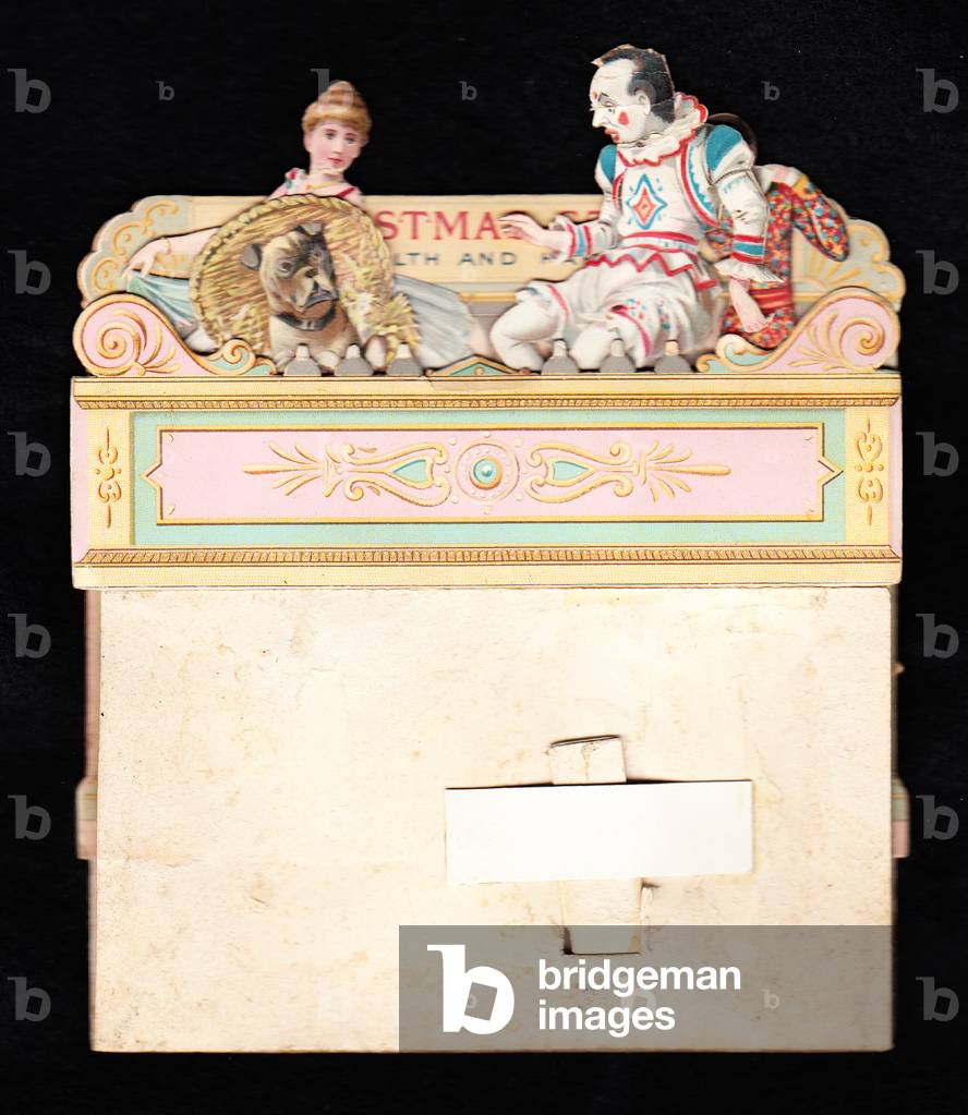 A Victorian die cut pop up Christmas card of a dancer, a clown and a performing dog, c.1880 (colour litho)