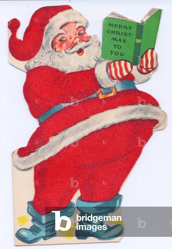 A die-cut Xmas Card of Father Christmas reading a book, his costume covered with red flocking, circa 1910 (coloured lithograph)