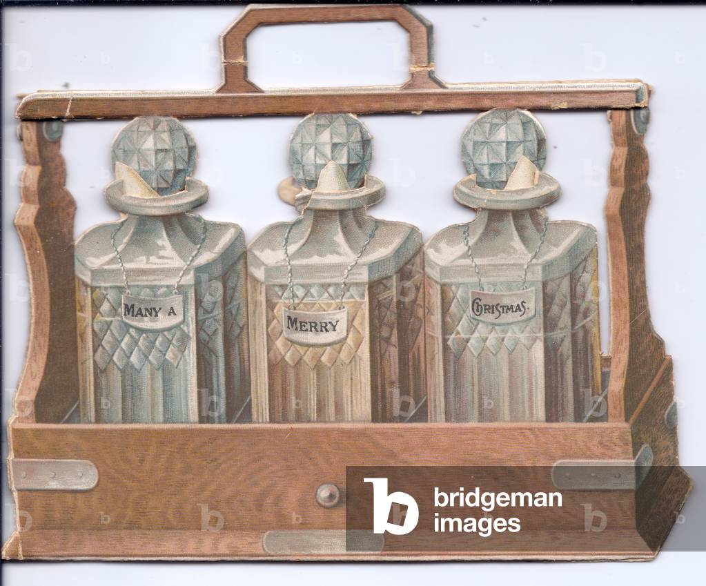 A Victorian die cut Christmas card of three crystal decanters in a tantalus, c.1880 (colour litho)