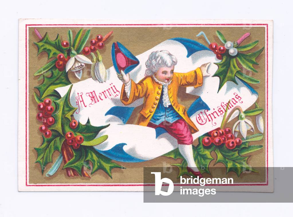 A Victorian Christmas card of a boy dressed in regency costume bursting out of a scroll, c.1880 (colour litho)