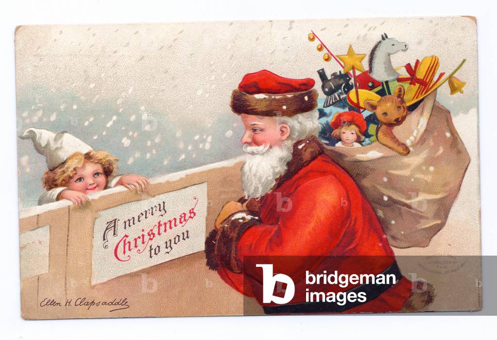 Edwardian Christmas postcard of Father Christmas with a sack of toys over his shoulder speaking to a child over a gate, c.1910 (colour litho)