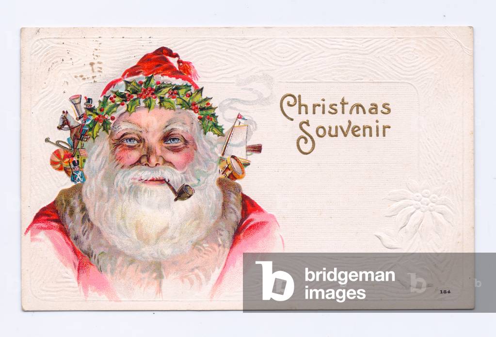 Edwardian Christmas postcard of Father Christmas wearing a hood decorated with holly and toys, c.1910 (colour litho)