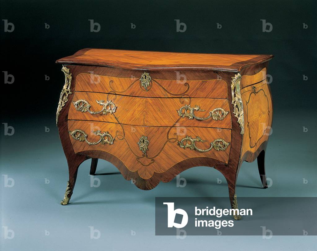 Rococo commode, mid 18th century (ormolu mounted amaranth, tulipwood & marquetry)