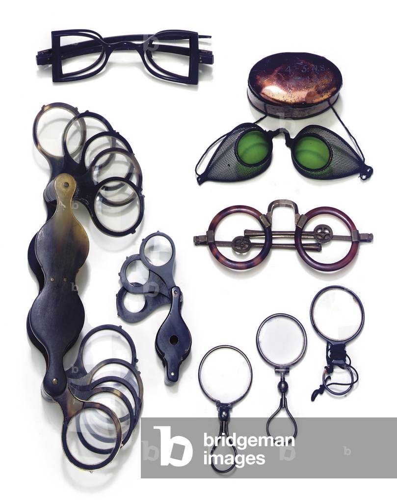 An assorted collection of eyewear and magnifiers (glass, tortoiseshell & metal)