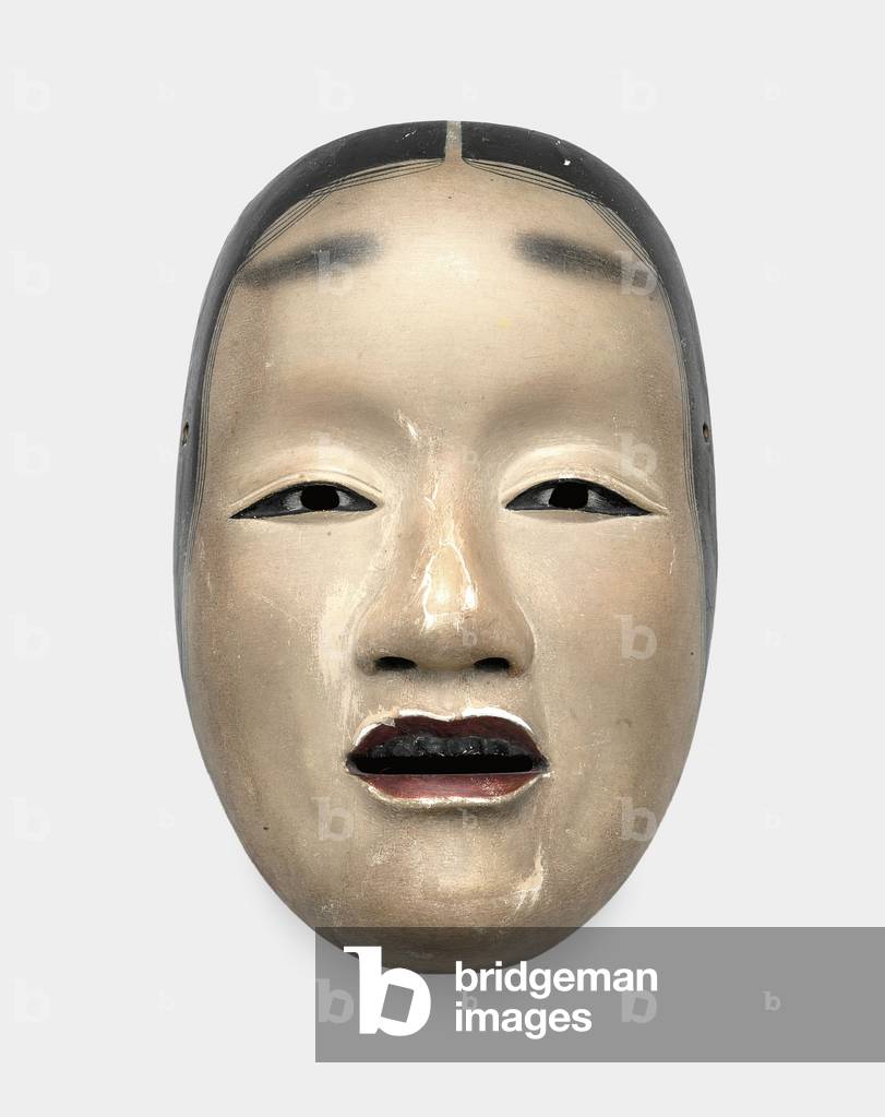 A wood mask with gofun ground, painted with sumi for the hair, eyes and teeth and red for the lips (wood, gofun, sumi)