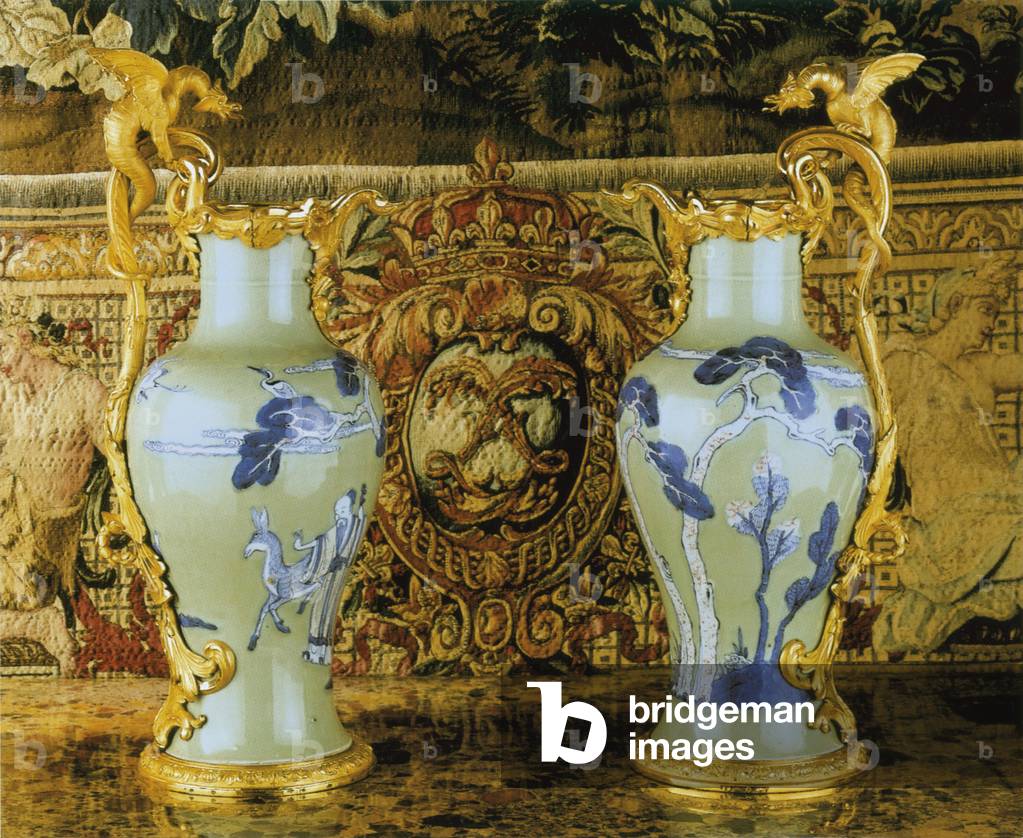 A pair of Louis XV ewers, porcelain 1662-1722, mounts c.1745-49 (ormolu-mounted porcelain)