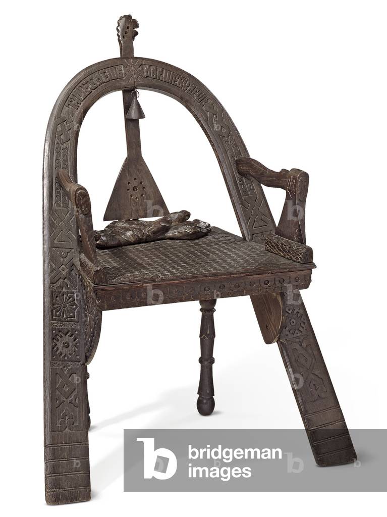 Carved trompe l'oeil chair, late 19th century (stained oak)