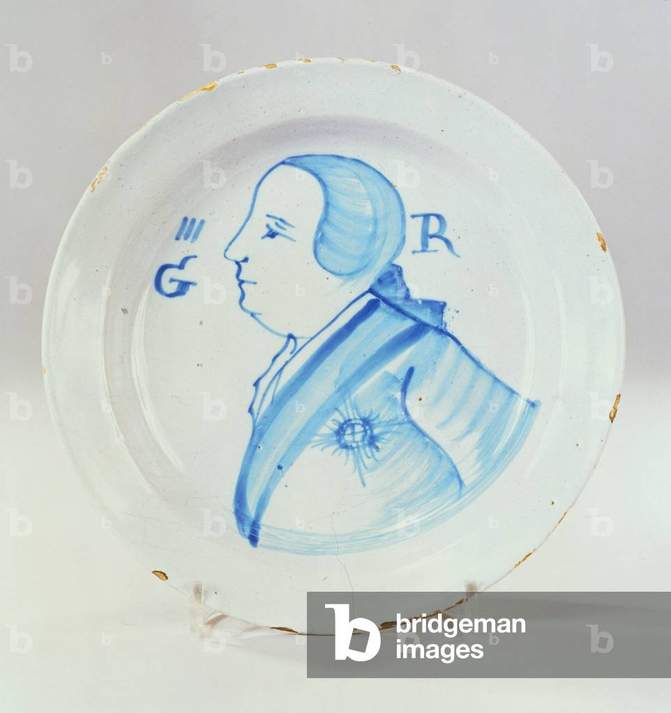A Lambeth Delft blue and white royal portrait dish painted with a half length portrait of George III, c.1761 (ceramic)