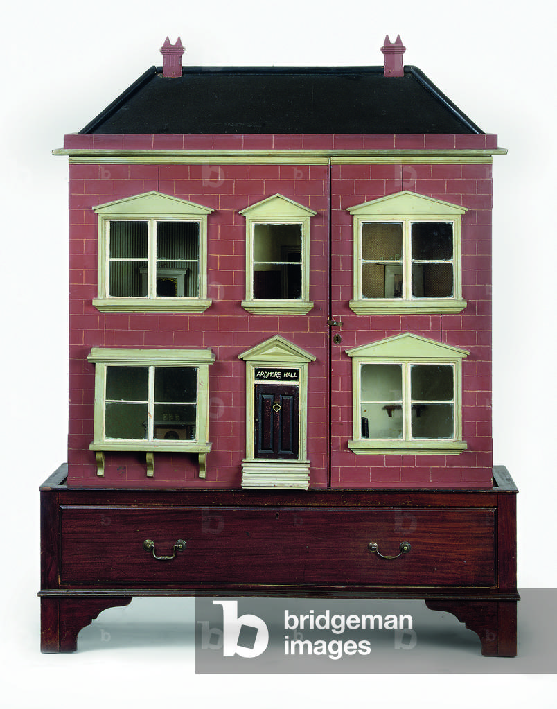 Doll's house on associated base with drawer (wood)