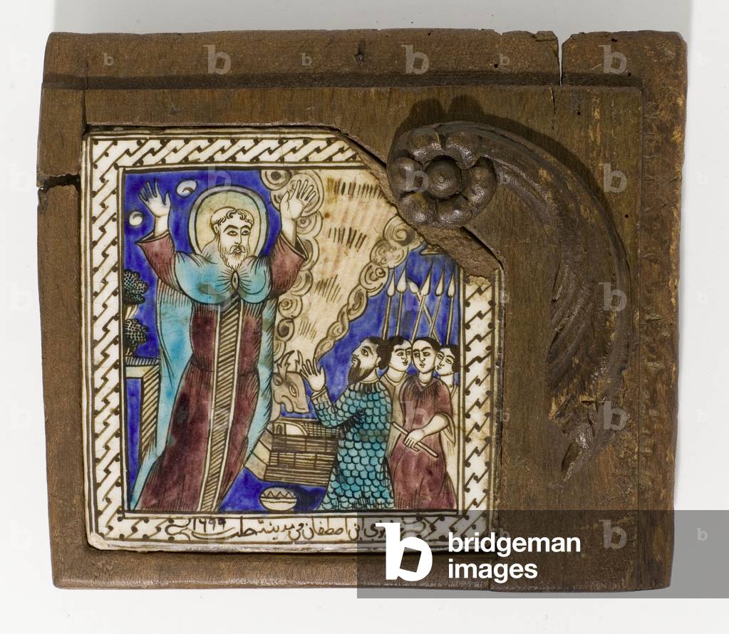 A signed and dated Syrian ceramic tile, painted in managanese, blue and brown, dated 1699, 1699 (ceramic)