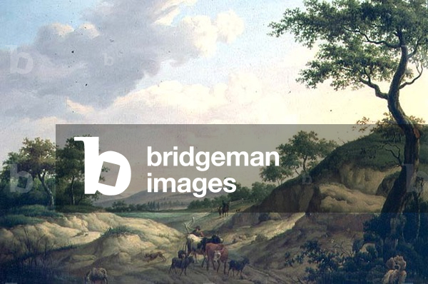 A wooded landscape with herdsmen and animals on a rock