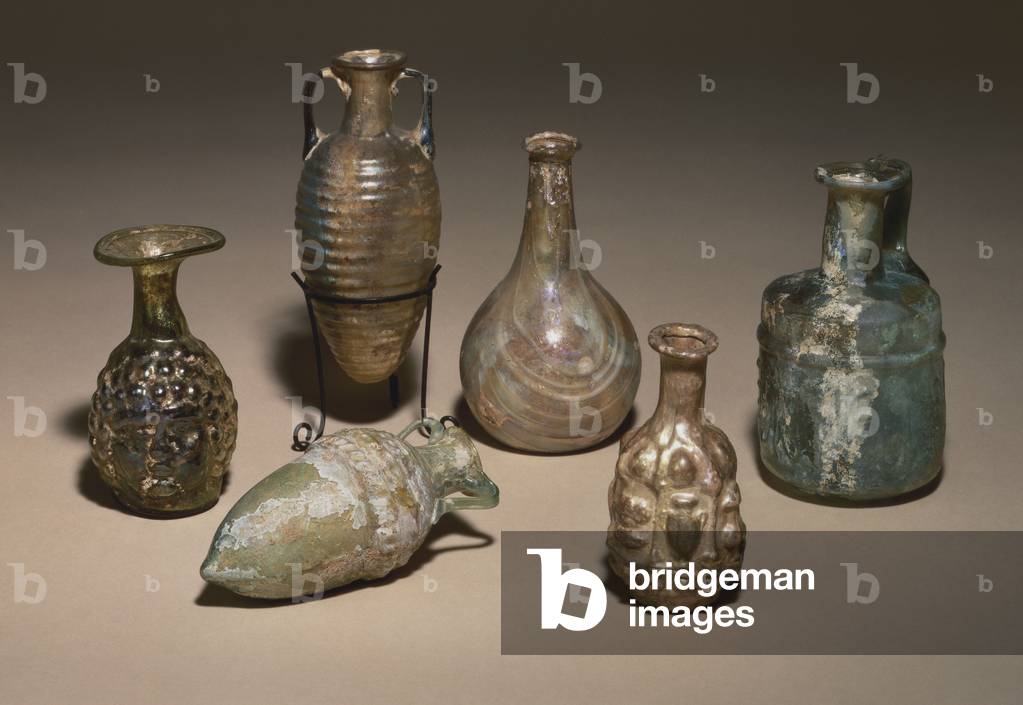 A group of delicate Roman blown and mould blown glass cosmetics flasks, 1st century AD (glass)