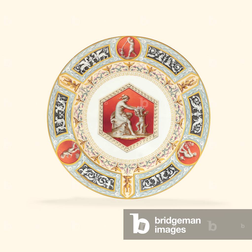 A porcelain dinner plate from the Raphael Service, the centre depicting a classicising lady and a putto, 1903 (porcelain)