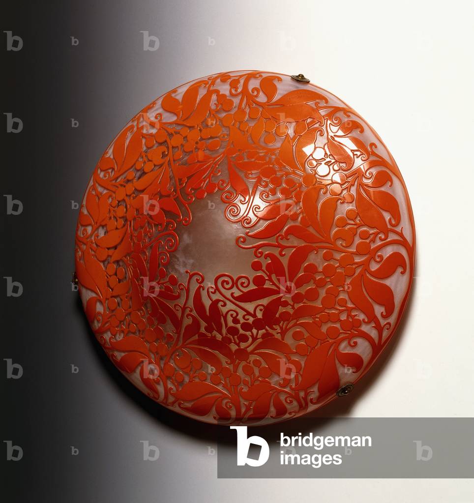 A hanging shade designed by the Daum Brothers, decorated with a coral-coloured design of berries and leaves, 20th century (glass, enamel)