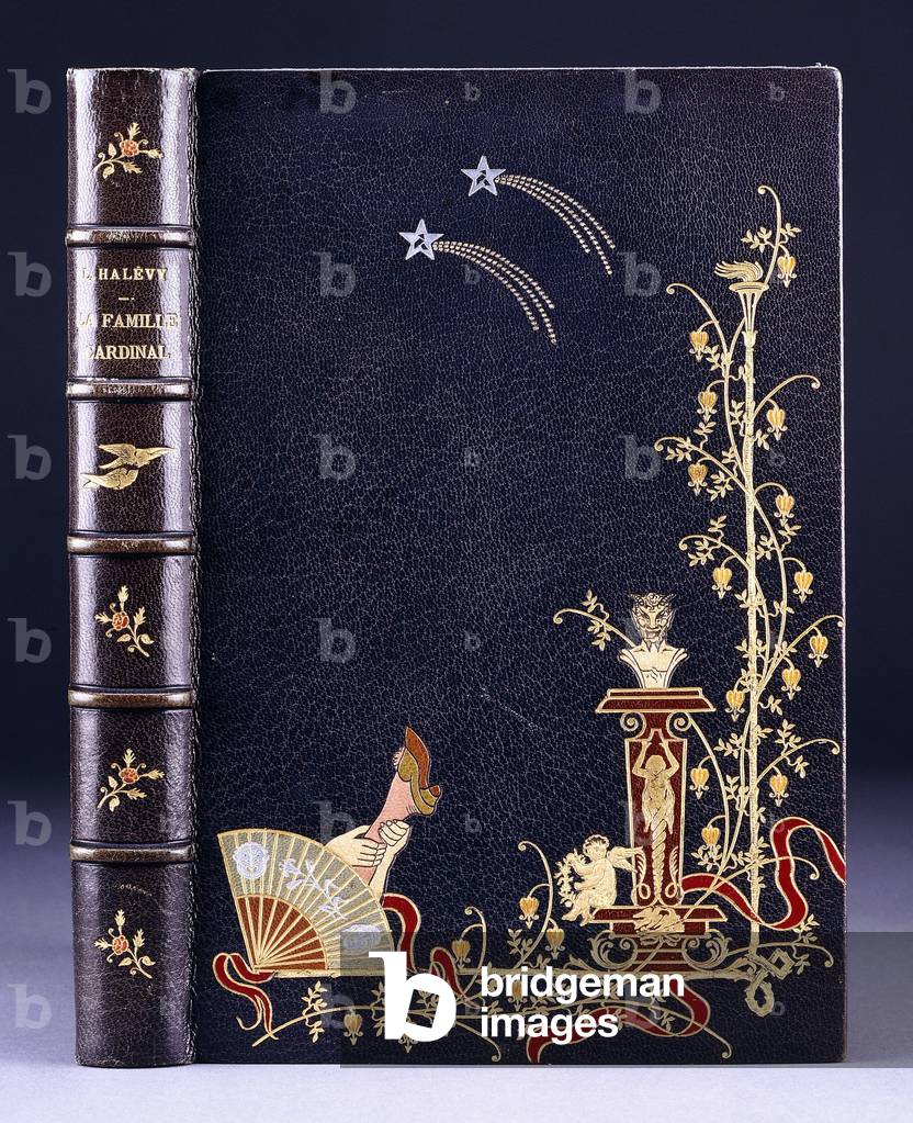 Upper book cover of two shooting-stars, a torch, foliage, faun on pedestal, putto and a leg behind a fan, 1893 (contemporary anacreontic binding of dark-blue crushed levant mor)