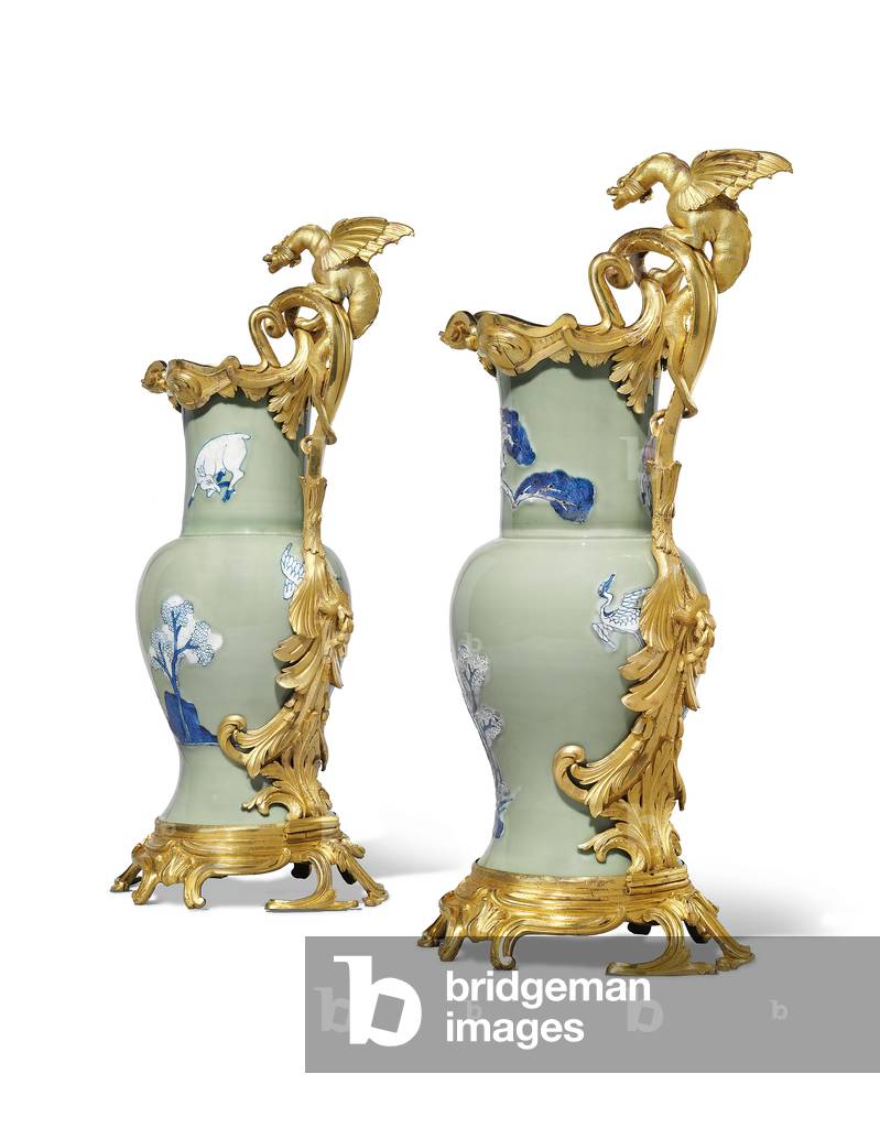 A pair of Louis XV ewers, porcelain 1662-1722, mounts c.1745-49 (ormolu-mounted porcelain)