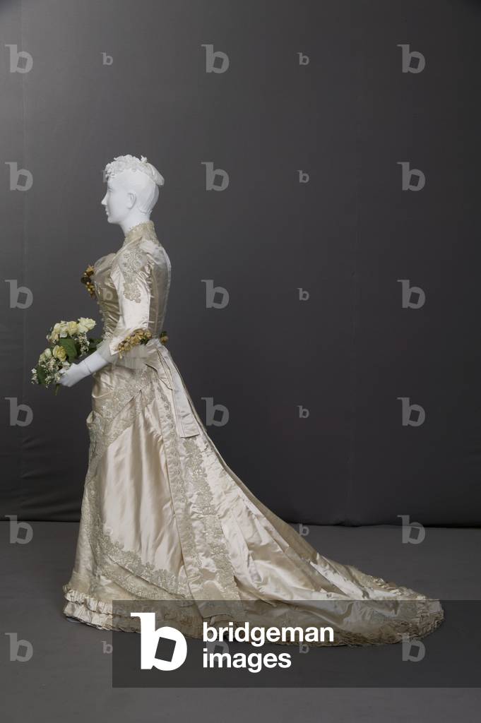 Wedding dress, 1880 (side view), Silk satin, lace, glass beads, net, wax flowers, Maker unknown