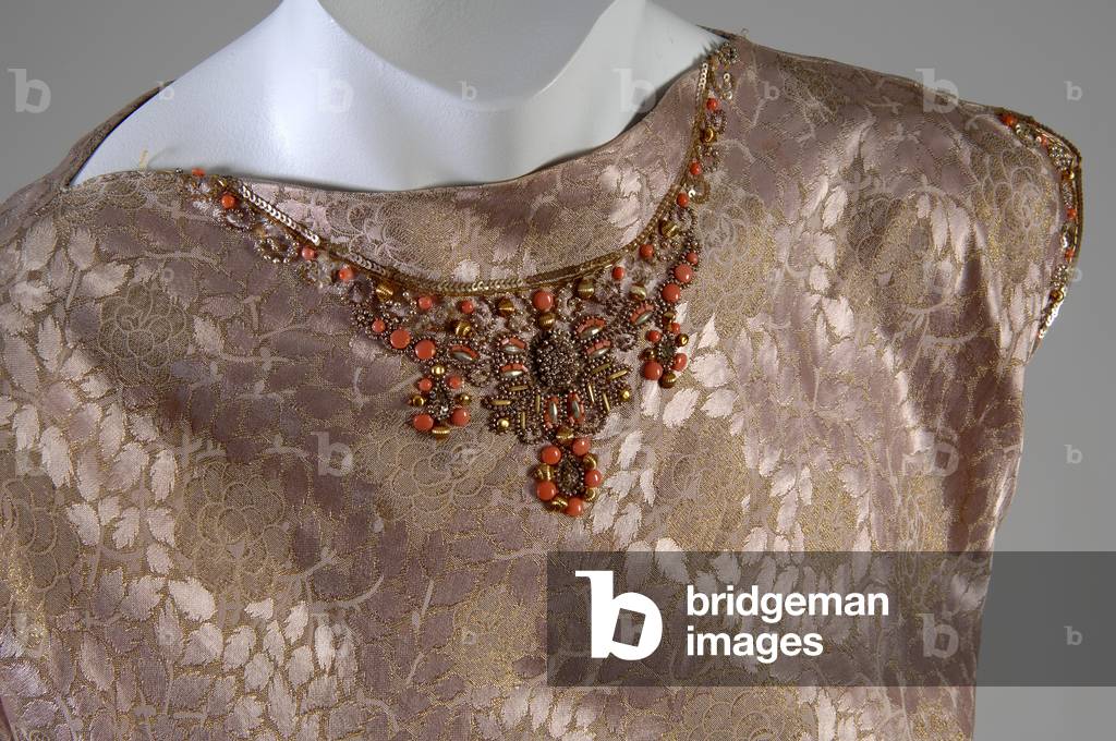 Evening dress, c.1938 (front oblique view of neckline detail), Silk brocade, glass beads, and coral trim, Mainbocher, France