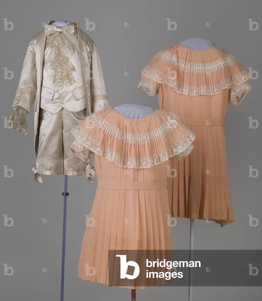 Page boy ensemble, 1897 (satin, linen twill, silk braid lace) and flower girl dresses, 1933 (crepe georgette, lace)