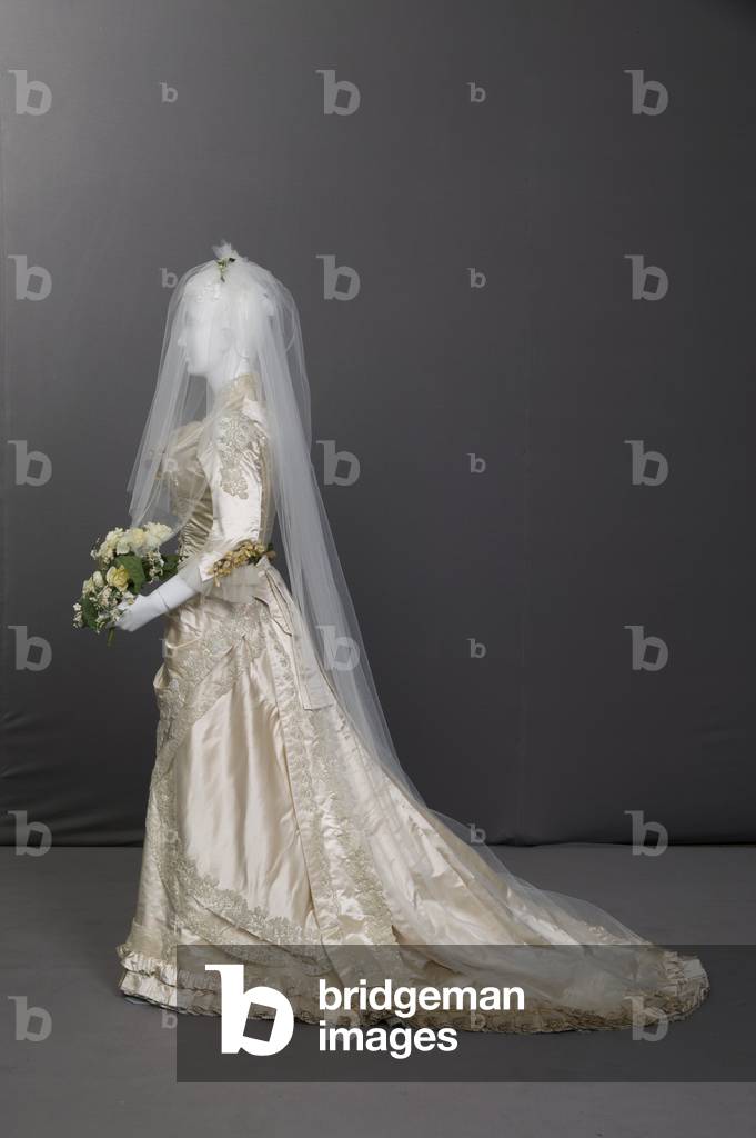 Wedding dress, 1880 (side view), Silk satin, lace, glass beads, net, wax flowers, Maker unknown