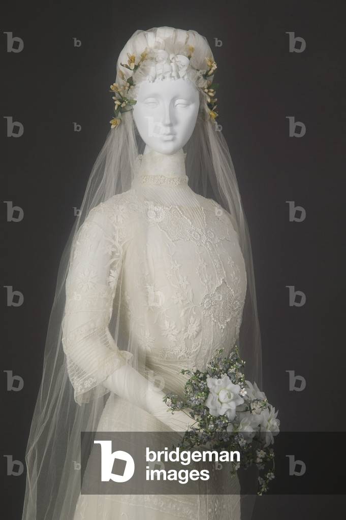 Wedding dress, 1910 (front oblique detail), Embroidered net, lace, Maker unknown