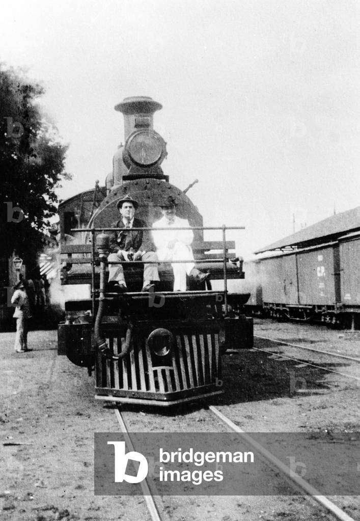 Darius Milhaud and Paul Claudel seated on a steam trip on a trip while 'en poste' at the French Embassy in Rio da Janeiro, Brazil, 1915-16 (b/w photo)