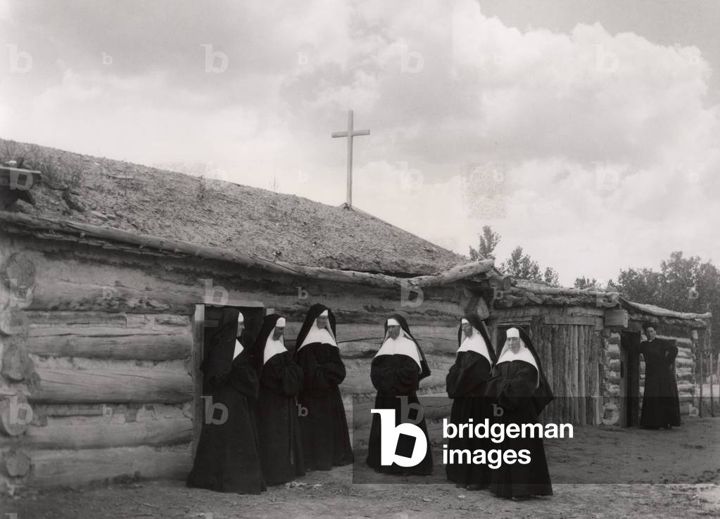 Nuns in front of the Saint Labre mission, Ashland, Montana (b/w photo)