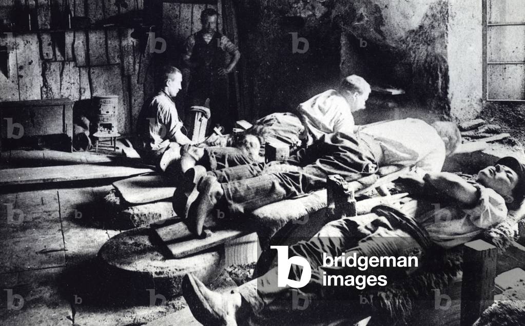 Cutlers at work in Thiers, late 19th century (b/w photo)