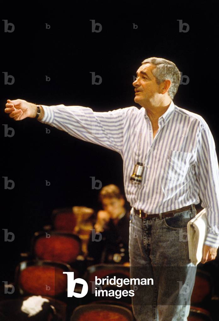 The director Jacques Demy during the shooting of the film Trois places for the 26 THREE PLACES FOR THE 26TH by Jacques Demy, 1988.
