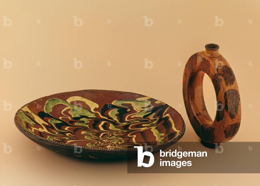 Redware oval dish with marbled glaze and water carrier (ceramic)