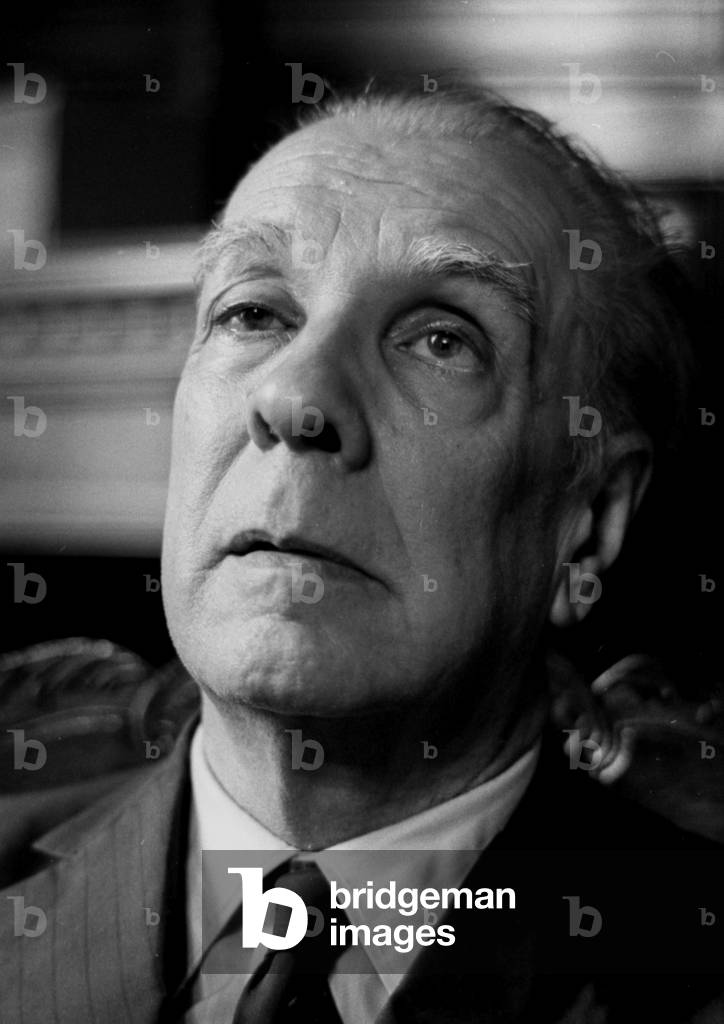 Jorge Luis Borges at the Biblioteca Nacional old headquarters (Mexico 562, Buenos Aires) where he was director, 1971 (b/w photo)