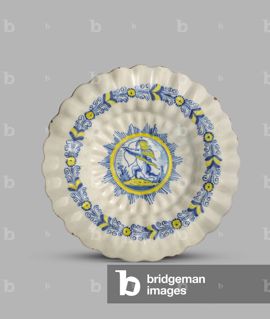 Moulded dish with scalloped rim and a running cupid in the centre, 1650-1700 (tin-glazed earthenware (maiolica))