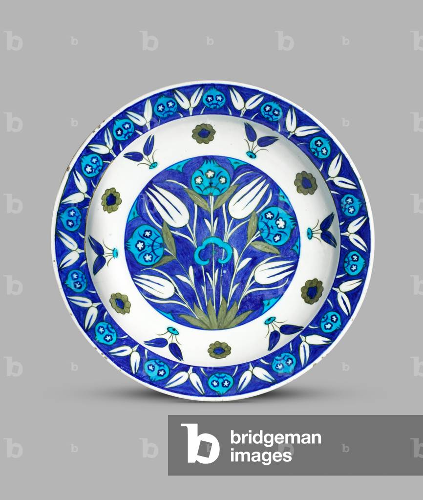 Dish decorated with pomegranates, tulips and rosettes, c.1550-c.1560 (fritware (cobalt blue, turquoise and olive green glaze))