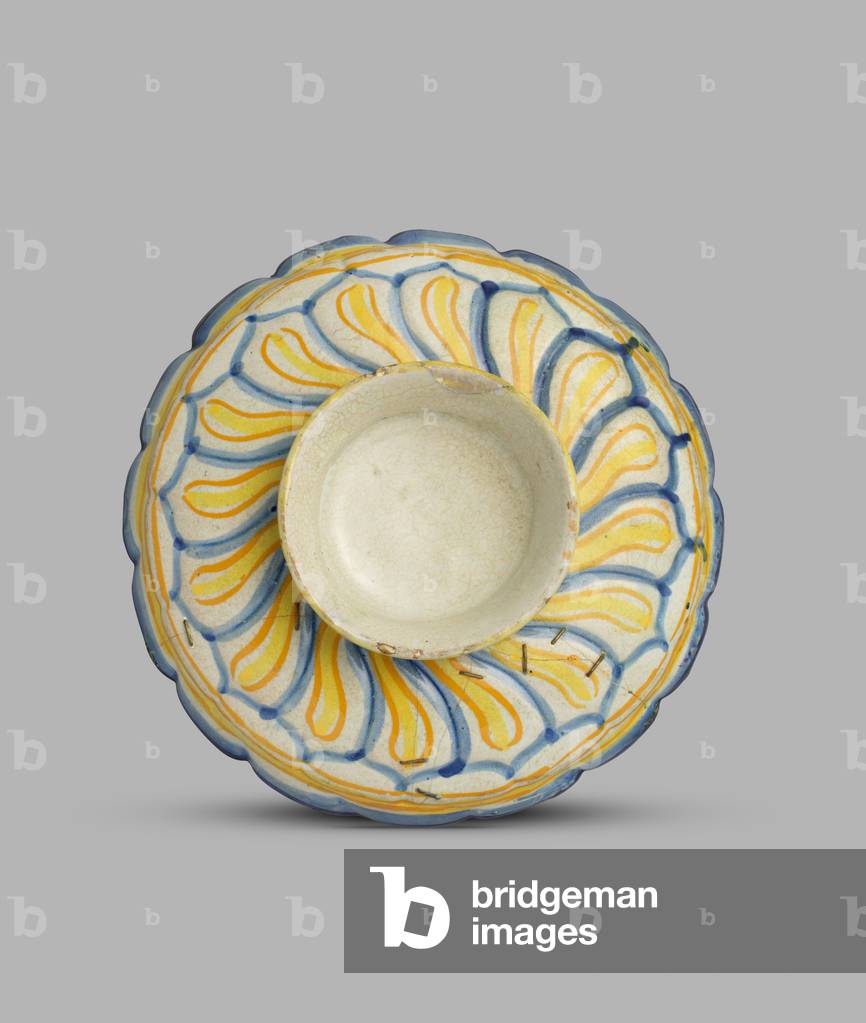 Fluted dish with a boy on horseback in the centre, c.1540-c.1550 (tin-glazed earthenware)